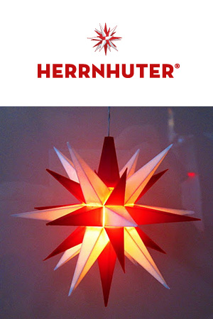 Logo und Leuchtenbeispiel von Herrnhuter Sterne